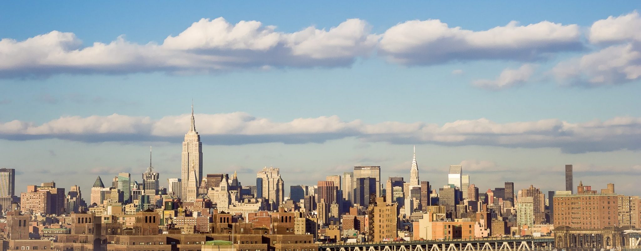 New York skyline in daytime with a view of the Empire State Buildling