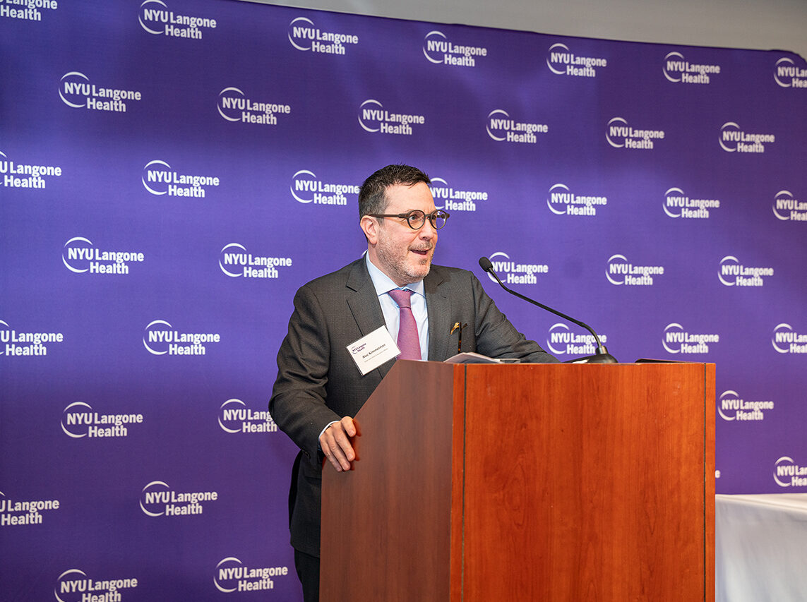 Dr. Alec Kimmel at the podium